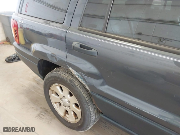 2001 Jeep Grand Cherokee Laredo with VIN 1J4GW48S91C525711, listed as a IAAI auction lot 42048952 with 1 mi miles. Bid and sale history available at carsss.com. Image 6.