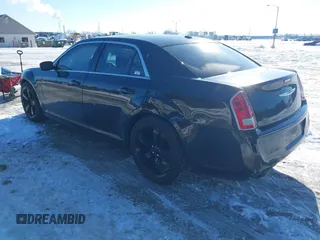2012 Chrysler 300 S with VIN 2C3CCABG7CH140782, listed as a IAAI auction lot 41343344 with 244,577 mi miles and . Bid and sale history available at carsss.com. Image 3.