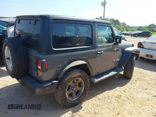 2020 Jeep Wrangler Sport S with VIN 1C4GJXAN5LW146068, listed as a IAAI auction lot 42071619 with 51,238 mi miles and . Bid and sale history available at DreamBid. Image 4.