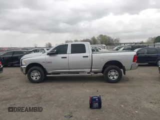 2015 Ram 2500 Tradesman z VIN 3C6UR5CL7FG557414, wystawiony jako IAAI lot #41829862 z przebiegiem 106 106 mil mil oraz . Historia ofert i sprzedaży dostępna na DreamBid. Obrazek 14.