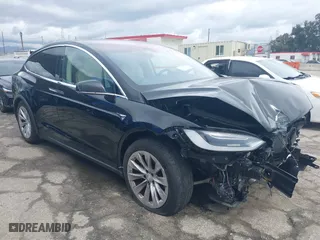 2018 Tesla Model X 75D with VIN 5YJXCDE26JF112795, listed as a IAAI auction lot 41735287 with 77,150 mi miles. Bid and sale history available at carsss.com. Image 1.