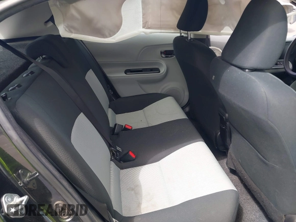 2014 Toyota Prius One z VIN JTDKDTB33E1569335, wystawiony jako IAAI lot #42483772 z przebiegiem Nie podano mil oraz . Historia ofert i sprzedaży dostępna na DreamBid. Obrazek 8.