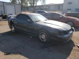 1998 Ford Mustang with VIN 1FAFP444XWF176396, listed as a Copart auction lot 61322984 with 86,168 mi miles and Salvage title. Bid and sale history available at DreamBid. Image 4.