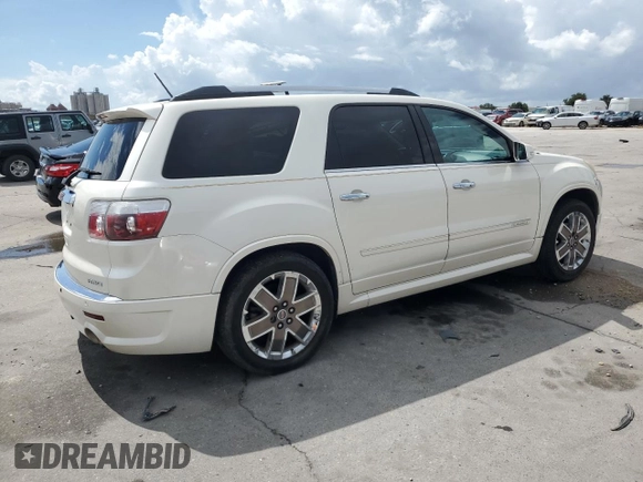 2012 GMC Acadia Denali with VIN 1GKKVTED7CJ335248, listed as a Copart auction lot 69451384 with 124,641 mi miles and Salvage Title. Bid and sale history available at carsss.com. Image 3.