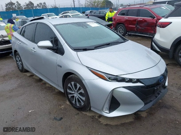 2021 Toyota Prius Prime LE with VIN JTDKAMFP9M3188569, listed as a IAAI auction lot 41712793 with 144,722 mi miles. Bid and sale history available at carsss.com. Image 1.