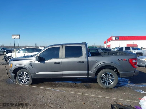 2022 Ford F-150 XL with VIN 1FTFW1E80NKE99701, listed as a IAAI auction lot 41621343 with 34,293 mi miles. Bid and sale history available at carsss.com. Image 14.
