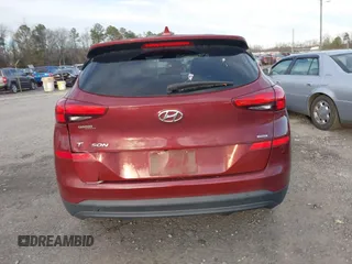 2019 Hyundai Tucson SE with VIN KM8J2CA49KU881841, listed as a IAAI auction lot 41099575 with 129,153 mi miles. Bid and sale history available at carsss.com. Image 16.