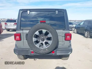 2018 Jeep Wrangler Unlimited Sahara z VIN 1C4HJXEN9JW215890, wystawiony jako IAAI lot #41215063 z przebiegiem 39 567 mil mil oraz . Historia ofert i sprzedaży dostępna na DreamBid. Obrazek 16.