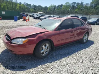 2002 Ford Taurus SE Standard z VIN 1FAFP53U22G197142, wystawiony jako Copart lot #52253765 z przebiegiem 184 803 mil mil oraz Szkoda całkowita • Salvage title. Historia ofert i sprzedaży dostępna na DreamBid. Obrazek 1.