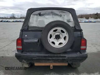 1993 Geo Tracker z VIN 2CNBE18U6P6927170, wystawiony jako Copart lot #48283925 z przebiegiem 178 293 mil mil oraz Tytuł czysty. Historia ofert i sprzedaży dostępna na DreamBid. Obrazek 6.