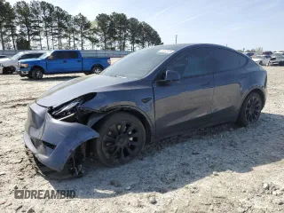 2023 Tesla Model Y Long Range z VIN 7SAYGAEE9PF662103, wystawiony jako Copart lot #51332105 z przebiegiem 35 294 mil mil oraz Szkody całkowita. Historia ofert i sprzedaży dostępna na DreamBid. Obrazek 1.