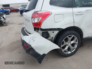 2016 Subaru Forester Touring z VIN JF2SJAVC2GH465083, wystawiony jako IAAI lot #42287323 z przebiegiem Nie podano mil oraz . Historia ofert i sprzedaży dostępna na DreamBid. Obrazek 17.