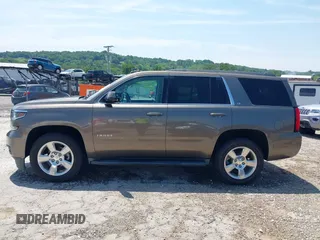 2016 Chevrolet Tahoe LT z VIN 1GNSCBKC8GR210829, wystawiony jako IAAI lot #42459936 z przebiegiem 160 518 mil mil oraz . Historia ofert i sprzedaży dostępna na DreamBid. Obrazek 15.