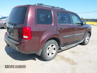 2010 Honda Pilot LX with VIN 5FNYF3H29AB004088, listed as a IAAI auction lot 42339270 with 242,385 mi miles and . Bid and sale history available at DreamBid. Image 4.