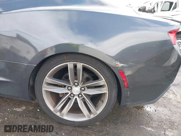 2017 Chevrolet Camaro 1LT z VIN 1G1FB1RS0H0192751, wystawiony jako IAAI lot #42243073 z przebiegiem 124 003 mil mil oraz . Historia ofert i sprzedaży dostępna na DreamBid. Obrazek 17.