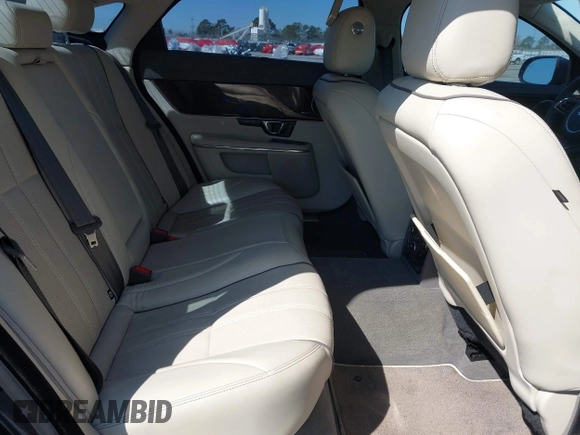 2014 Jaguar XJ Portfolio with VIN SAJWA2GZ4E8V60251, listed as a IAAI auction lot 41778702 with 45,180 mi miles and . Bid and sale history available at DreamBid. Image 8.