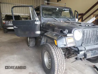 2004 Jeep Wrangler Sport z VIN 1J4FA49S44P746039, wystawiony jako Copart lot #51982795 z przebiegiem Nie podano mil oraz Czysty tytuł • Clean title. Historia ofert i sprzedaży dostępna na DreamBid. Obrazek 4.