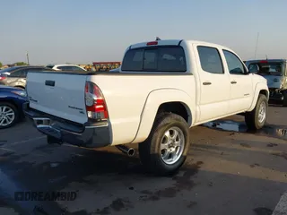 2014 Toyota Tacoma PreRunner with VIN 3TMJU4GN3EM160587, listed as a IAAI auction lot 42710985 with 200,867 mi miles and . Bid and sale history available at DreamBid. Image 4.