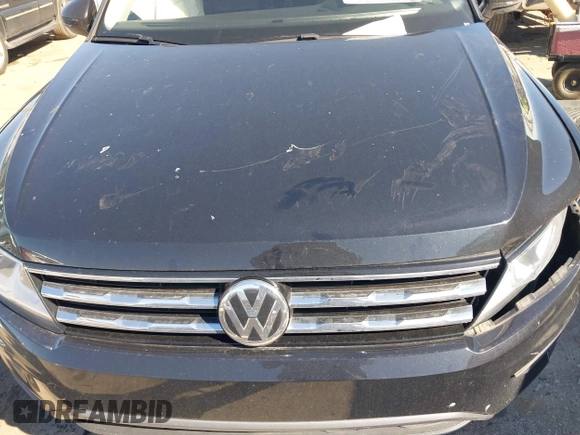 2021 Volkswagen Tiguan SE z VIN 3VV3B7AX4MM095811, wystawiony jako IAAI lot #41476490 z przebiegiem 25 668 mil mil oraz . Historia ofert i sprzedaży dostępna na DreamBid. Obrazek 11.