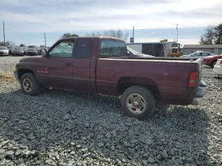 2000 Dodge Ram 1500 with VIN 1B7HC13Y4YJ104983, listed as a Copart auction lot 45980265 with 164,727 mi miles and Clean Title. Bid and sale history available at carsss.com. Image 2.
