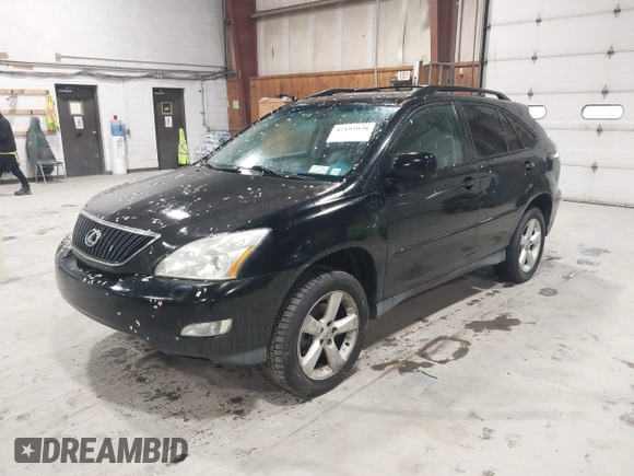 2004 Lexus RX with VIN 2T2HA31U74C036035, listed as a IAAI auction lot 42195070 with 200,689 mi miles. Bid and sale history available at carsss.com. Image 2.