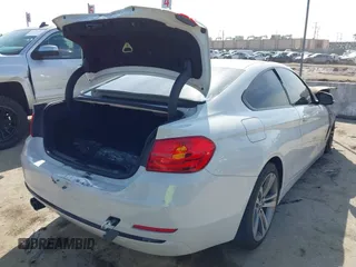 2015 BMW 4 Series 428i with VIN WBA3N7C53FK222492, listed as a IAAI auction lot 41612989 with Not Provided miles. Bid and sale history available at carsss.com. Image 4.