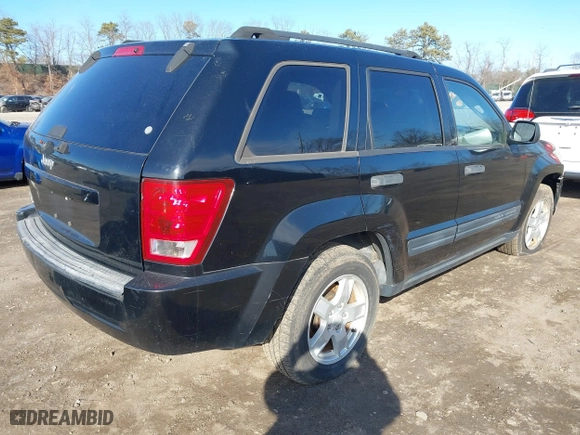 2006 Jeep Grand Cherokee Laredo with VIN 1J4GR48K16C142277, listed as a IAAI auction lot 41598878 with 169,236 mi miles. Bid and sale history available at carsss.com. Image 4.