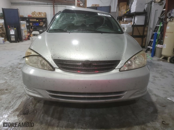 2004 Toyota Camry LE with VIN 4T1BE32K94U915756, listed as a Copart auction lot 50761005 with 404,136 mi miles and Salvage Title. Bid and sale history available at carsss.com. Image 5.