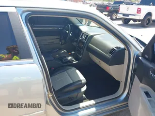 2006 Chrysler 300 Touring with VIN 2C3KA53G56H324954, listed as a IAAI auction lot 42058478 with 124,933 mi miles. Bid and sale history available at carsss.com. Image 5.