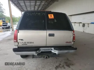 1999 GMC Yukon with VIN 1GKEC13R4XJ735246, listed as a Copart auction lot 56429874 with 258,616 mi miles and Salvage Title. Bid and sale history available at carsss.com. Image 6.