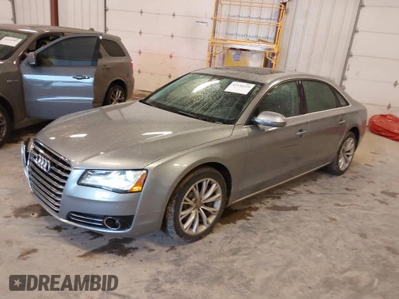 2012 Audi A8 with VIN WAURVAFD7CN021716, listed as a IAAI auction lot 42330229 with 97,359 mi miles and . Bid and sale history available at DreamBid. Image 17.
