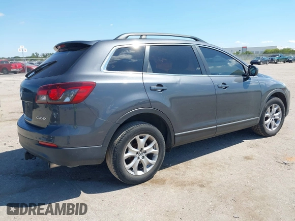 2015 Mazda CX-9 Sport with VIN JM3TB2BA7F0465965, listed as a IAAI auction lot 40348982 with 165,284 mi miles and . Bid and sale history available at carsss.com. Image 4.