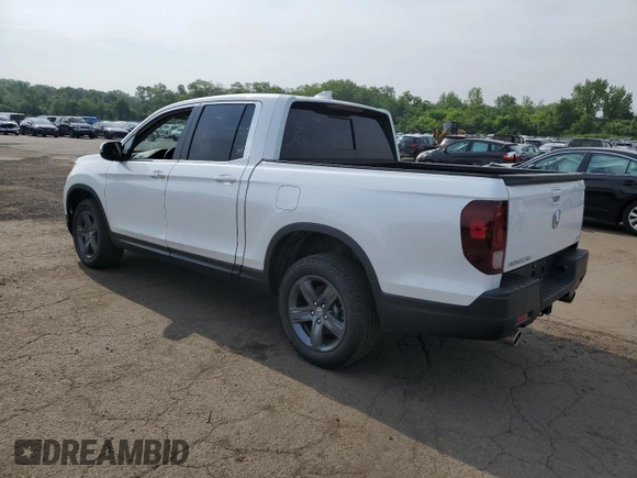 2023 Honda Ridgeline RTL with VIN 5FPYK3F53PB067003, listed as a Copart auction lot 58384895 with 31,983 mi miles and Salvage title. Bid and sale history available at DreamBid. Image 2.