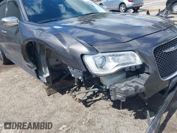 2016 Chrysler 300 with VIN 2C3CCAEG3GH324716, listed as a IAAI auction lot 41776116 with 134,978 mi miles. Bid and sale history available at carsss.com. Image 22.