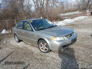 2003 Mazda Protege DX with VIN JM1BJ225131204265, listed as a IAAI auction lot 41475229 with 95,262 mi miles and . Bid and sale history available at DreamBid. Image 1.