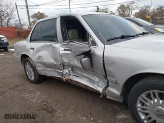 2010 Mercury Grand Marquis LS with VIN 2MEBM7FV1AX612153, listed as a IAAI auction lot 40979537 with 120,359 mi miles. Bid and sale history available at carsss.com. Image 6.