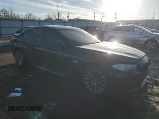 2013 BMW 5 Series 535i xDrive with VIN WBAFU7C52DDU68984, listed as a Copart auction lot 46117455 with 133,774 mi miles and Salvage Title. Bid and sale history available at carsss.com. Image 4.