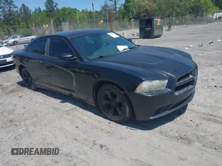 2013 Dodge Charger SE with VIN 2C3CDXBG5DH552376, listed as a IAAI auction lot 42039712 with 233,711 mi miles. Bid and sale history available at carsss.com. Image 1.