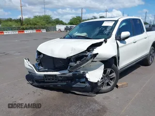 2019 Honda Ridgeline RTL with VIN 5FPYK2F52KB004624, listed as a IAAI auction lot 41789190 with 51,834 mi miles and . Bid and sale history available at DreamBid. Image 6.