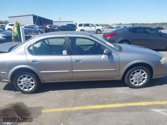 2000 Nissan Maxima GXE with VIN JN1CA31D8YT551822, listed as a IAAI auction lot 41845010 with 297,479 mi miles. Bid and sale history available at carsss.com. Image 13.