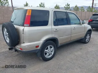 2000 Honda CR-V SE with VIN JHLRD1874YC046995, listed as a IAAI auction lot 42033059 with 218,484 mi miles. Bid and sale history available at carsss.com. Image 4.