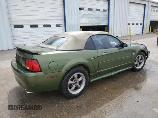 2004 Ford Mustang Deluxe with VIN 1FAFP44694F133635, listed as a Copart auction lot 50216915 with 0 mi miles and Salvage Title. Bid and sale history available at carsss.com. Image 3.