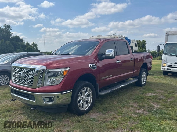2016 Nissan Titan Platinum Reserve z VIN 1N6BA1F26GN512666, wystawiony jako Copart lot #54364115 z przebiegiem 120 182 mil mil oraz Czysty tytuł • Clean title. Historia ofert i sprzedaży dostępna na DreamBid. Obrazek 2.