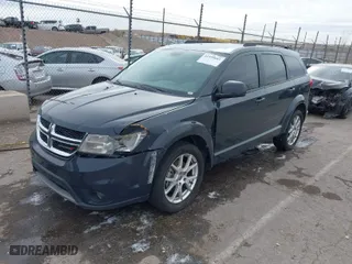 2018 Dodge Journey SXT with VIN 3C4PDCBB0JT243881, listed as a IAAI auction lot 41599681 with 143,893 mi miles. Bid and sale history available at carsss.com. Image 2.