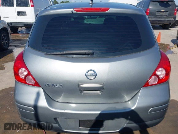 2009 Nissan Versa 1.8 SL with VIN 3N1BC13E19L372298, listed as a IAAI auction lot 42011338 with 131,882 mi miles. Bid and sale history available at carsss.com. Image 17.