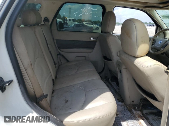 2009 Mercury Mariner Premier с VIN 4M2CU87709KJ14823, выставлен на аукционе Copart как лот 60121965 с пробегом Не указан миль и Списание • Salvage title. История ставок и продаж доступна на DreamBid. Изображение 11.