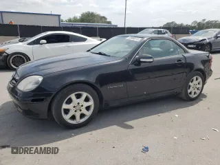 2003 Mercedes-Benz SLK 230 Kompressor with VIN WDBKK49F13F277323, listed as a Copart auction lot 53980515 with 174,276 mi miles and Salvage Title. Bid and sale history available at DreamBid. Image 1.
