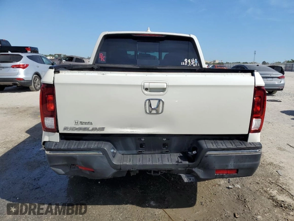 2019 Honda Ridgeline RTL-T with VIN 5FPYK2F62KB002624, listed as a Copart auction lot 50142765 with 62,947 mi miles and Salvage title. Bid and sale history available at DreamBid. Image 6.