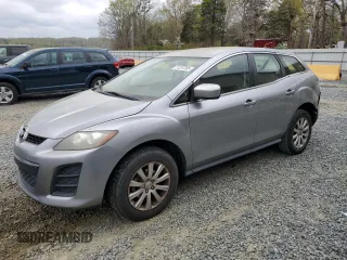 2010 Mazda CX-7 SV with VIN JM3ER2W50A0336914, listed as a Copart auction lot 51237285 with 121,684 mi miles and Salvage Title. Bid and sale history available at carsss.com. Image 1.