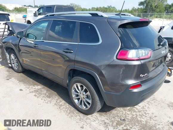 2019 Jeep Cherokee Latitude Plus with VIN 1C4PJLLB3KD143546, listed as a IAAI auction lot 42160353 with 69,296 mi miles and . Bid and sale history available at DreamBid. Image 3.
